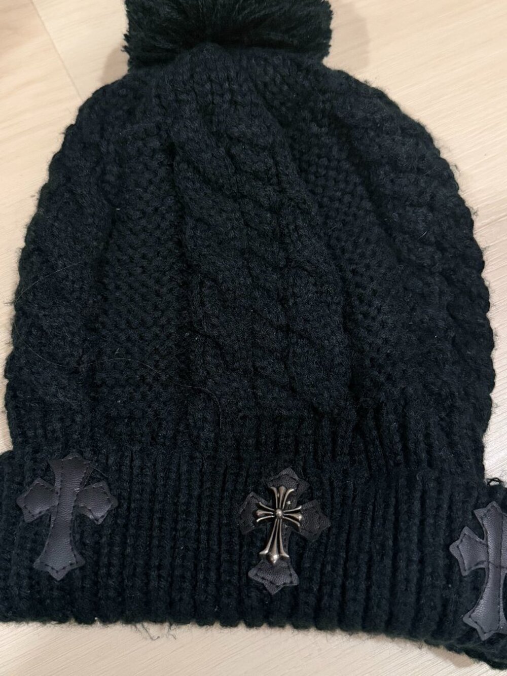 Black Knit Pom Beanie with Cross Detail